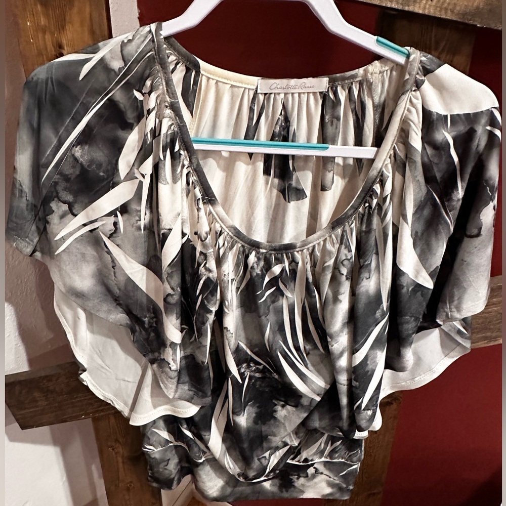 White and gray flowy sleeve top. Size small